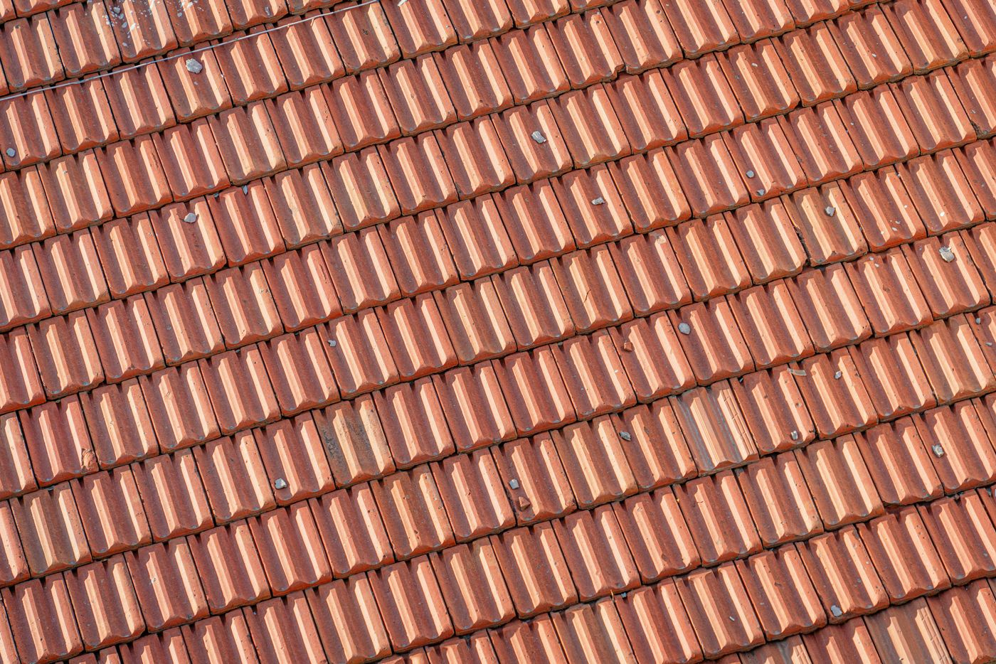 Overlapping terracotta roof tiles